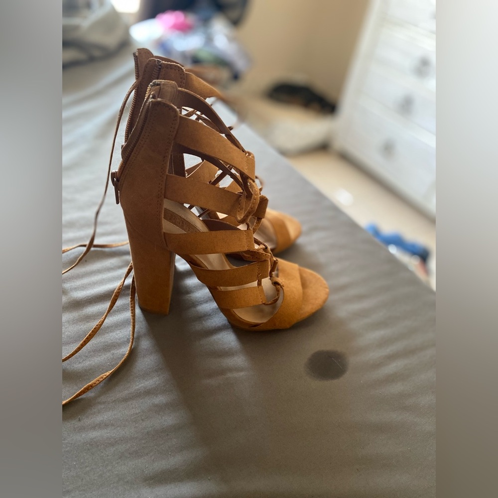 Brown tie up heels